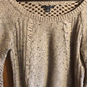 Grey light brown sweater with hole-details on back